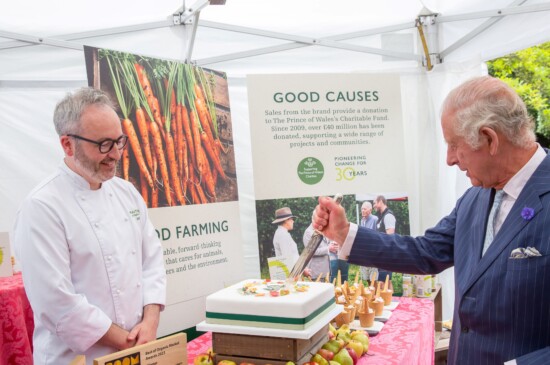 King Charles III cuts cake
